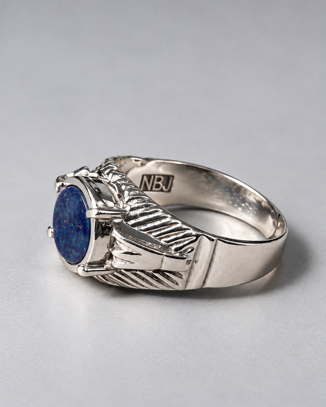 Silver ring with blue stone